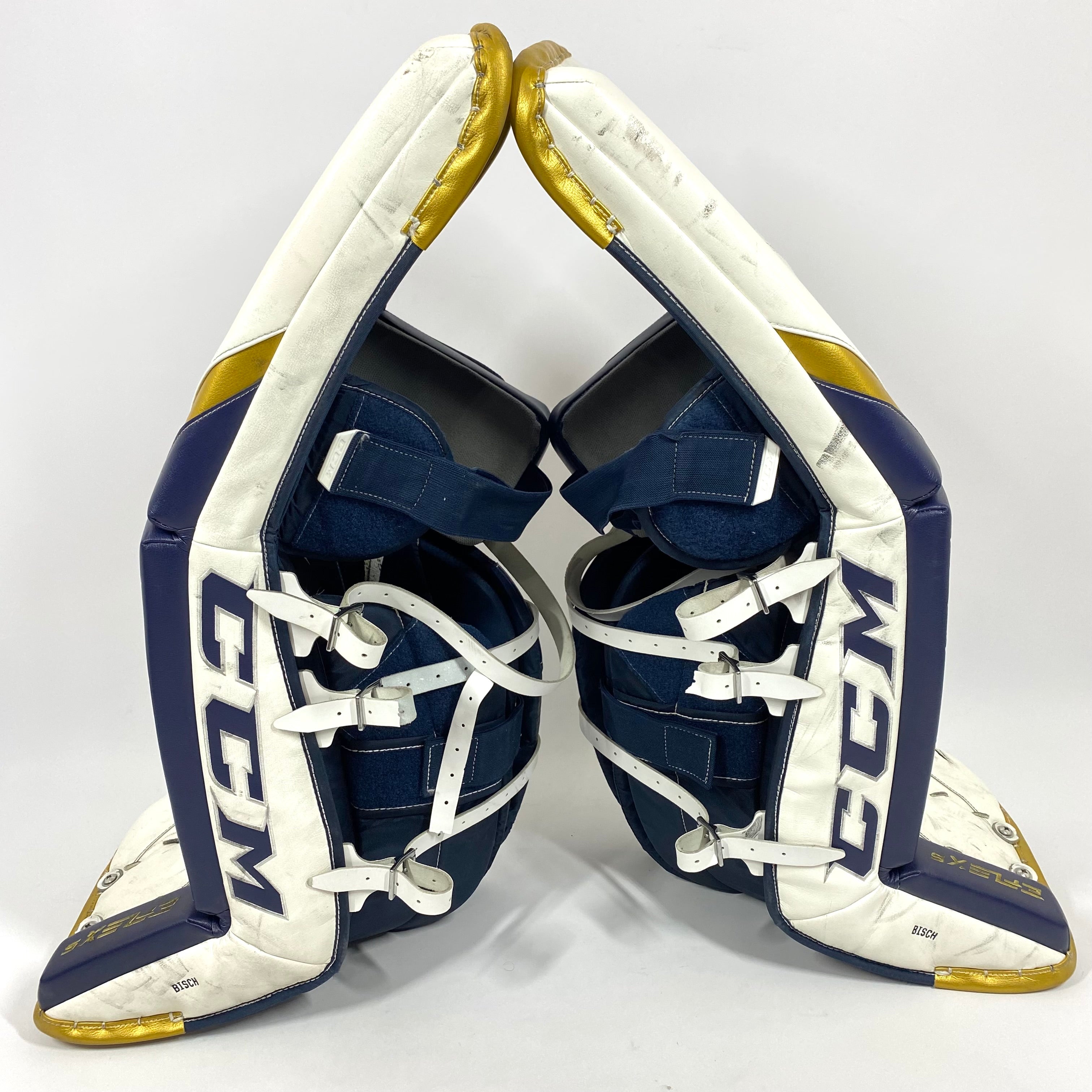 Extreme Flex 5 - Jambières de gardien NCAA Pro Stock d'occasion (blanc/bleu/or)